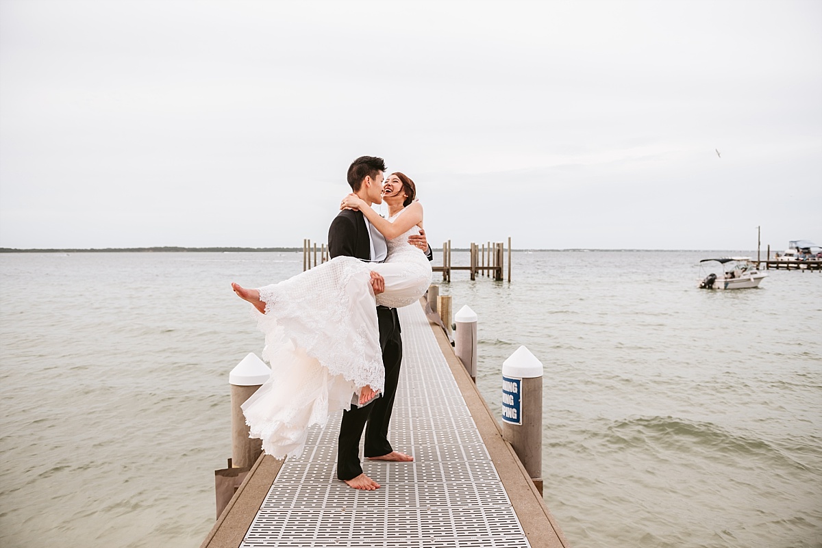 Bride and Groom portraits on the Dock at Hemingway's Island Grill in Pensacola, FL