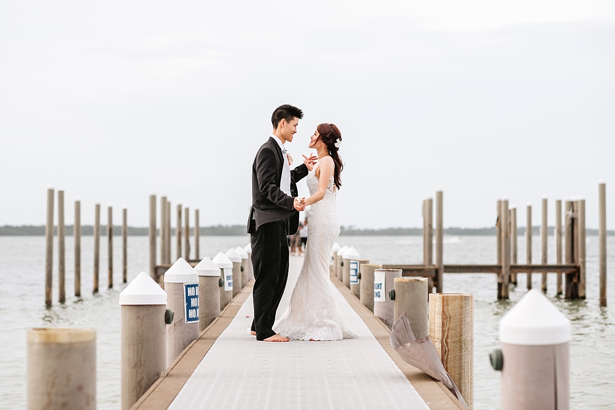 Bride and Groom portraits on the Dock at Hemingway's Island Grill in Pensacola, FL